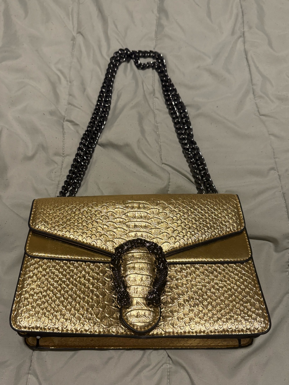 Metallic Gold Textured Shoulder Bag with Decorative Clasp